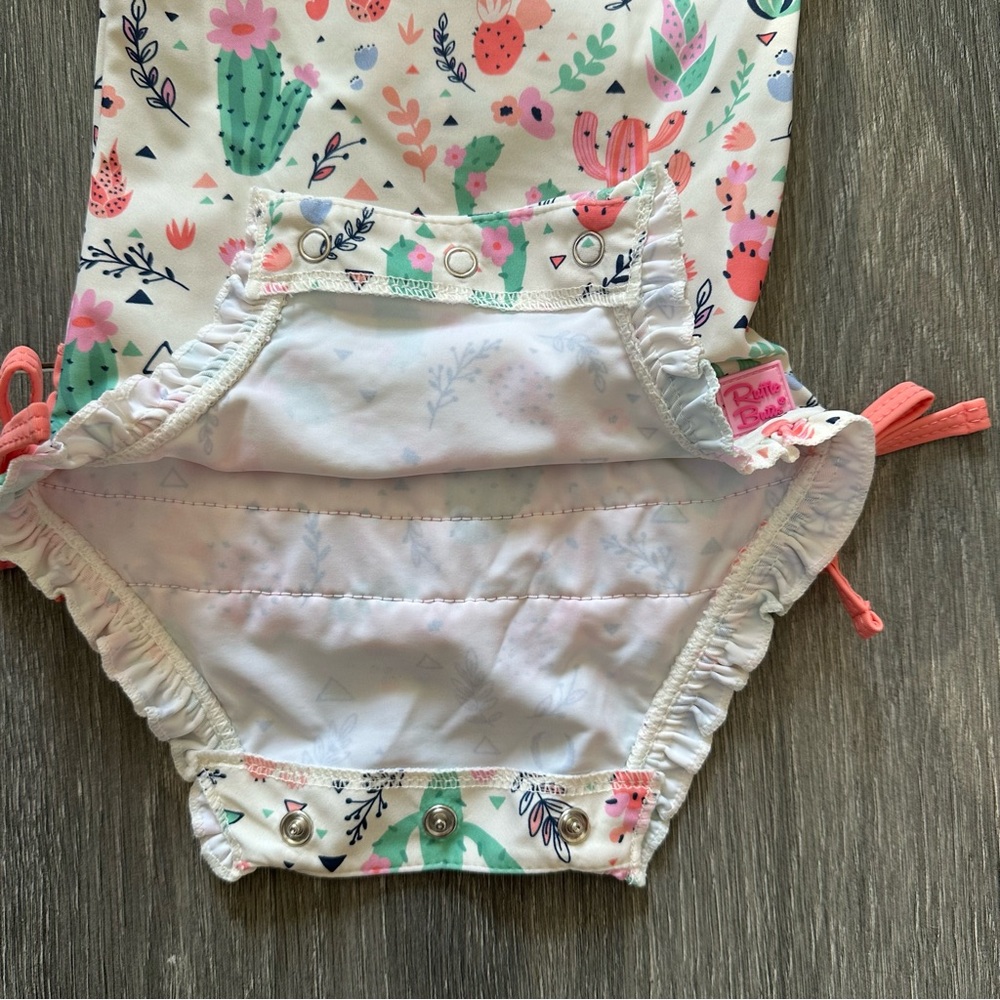 RuffleButts - Desert Blossoms One Piece Rash Guard - Picture 4 of 5